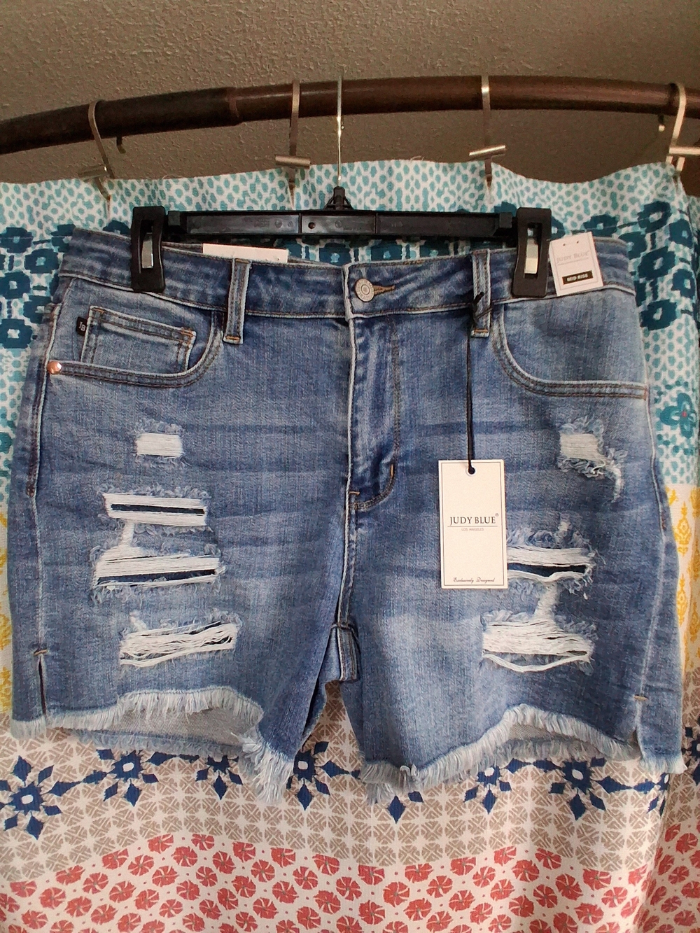 Judy Blue Light Blue Distressed Denim Shorts with Frayed Hem